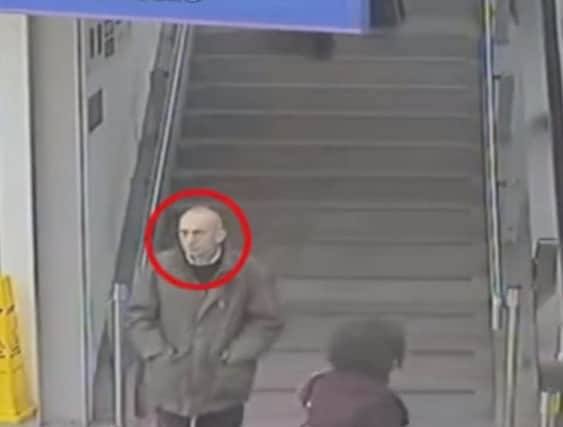 The man was captured on CCTV at Manchester Piccadilly train station on December 11.