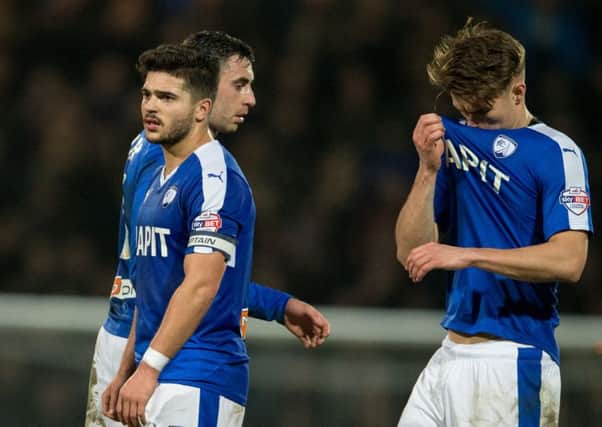 Chesterfield are dejected   at full time.  Pic: James Williamson