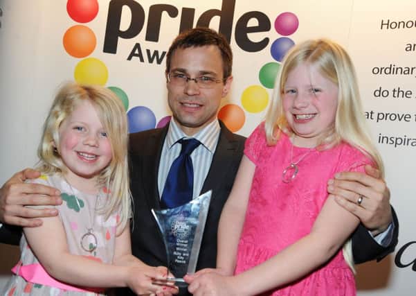 Derbyshire Times Pride Awards.
Ruby and Kitty Pearce pictured with Dom Stevens after receiving the Overall Winner Award.