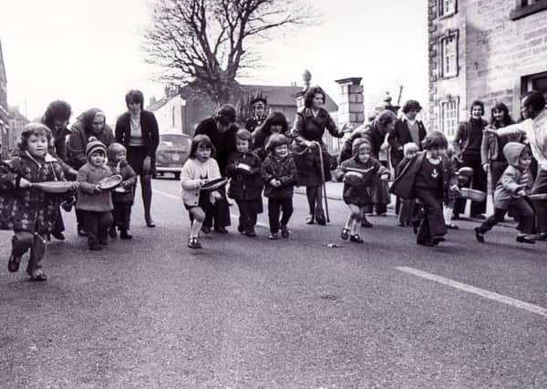 Pancake race at Winster, Matlock - 1970