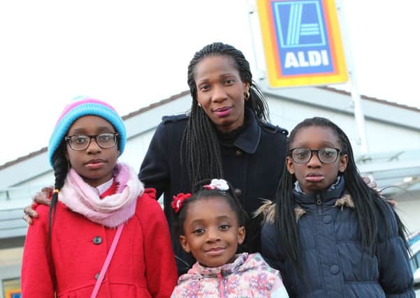 Ebbie Olukoya and her daughters Deborah, Dorothy and Bernice at the Shirebrook branch of Aldi.