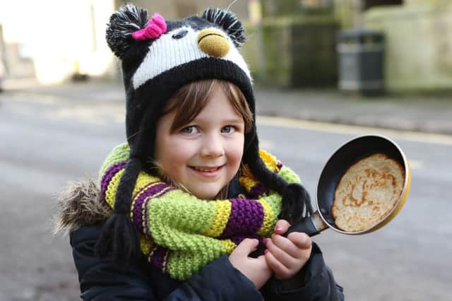 Winster pancake races, four year old Macy Roper