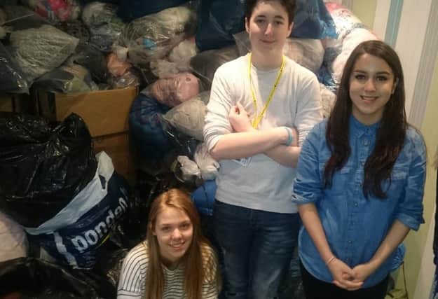 Pictured, left to right, are the three student volunteers Charlotte, Charlie and Louise