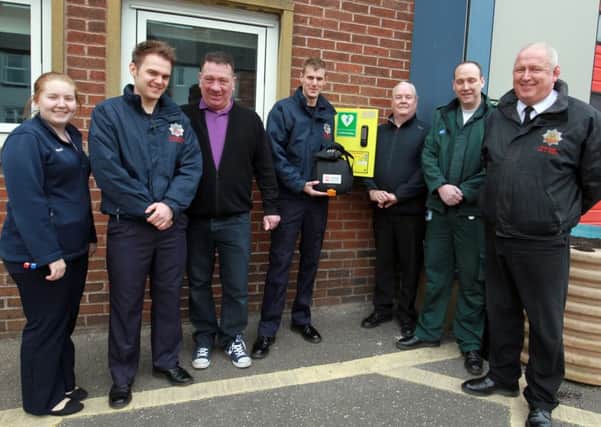 After a customer collapsed at the George and Dragon pub in Clay Cross members of the public decided to raise money for four defibs for the community. They are picrtured with one of them outside the fire station on Market Street. Pictured are Connie Taylor, Jim McLean, Tom Goddard, Danny Lane, Bob Curry, Scott Nelson and Nick Hinchley.