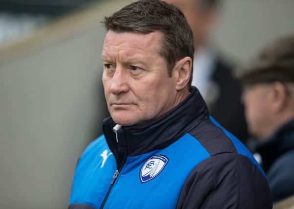 DANNY WILSON -- observed by the youngsters at a press conference.