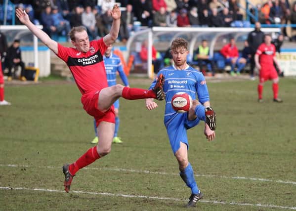 Matlock v Darlington (red), Liam Needham on the ball