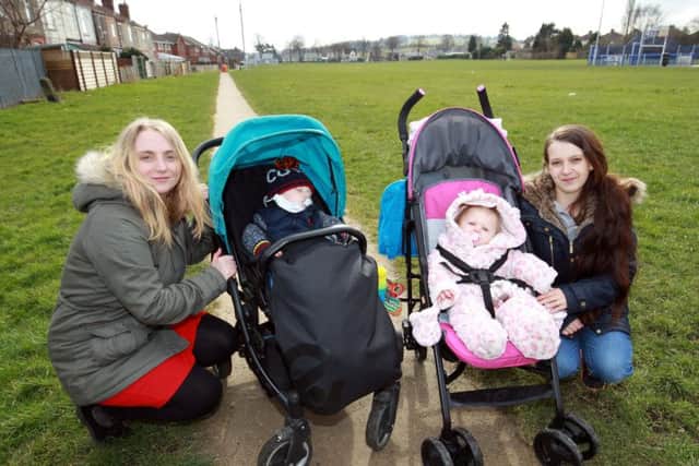 Mums Frances Dowsett and Cassey Smith with their children Ethan Dowsett-Barker, 11 months, and Anne-Mai Britland, 11 months, want to transform a park off Langer Lane.