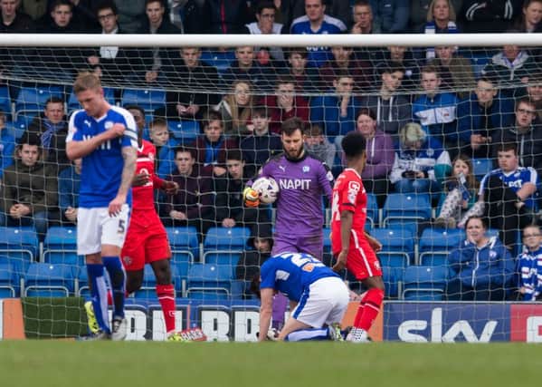 Chesterfield vs Walsall - Tom Anderson on the floor after scoring an own goal from a sliced clearance - Pic By James Williamson