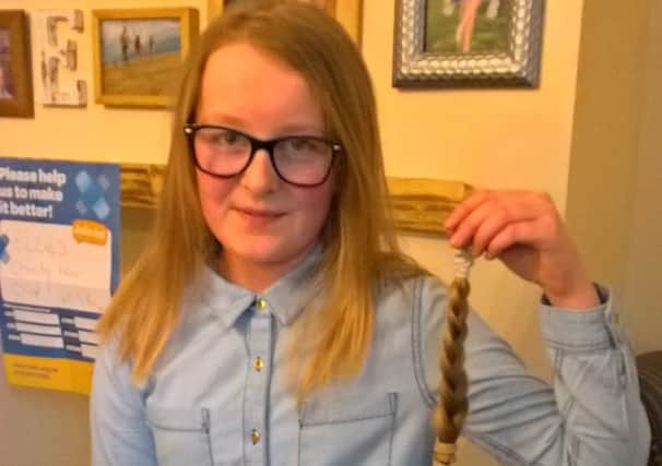 Ellie Chirms had her hair cut for Little Princess Trust