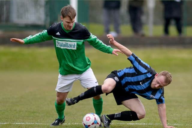 ACTION from the big top-of-the-table clash between Selston and Belper United.
