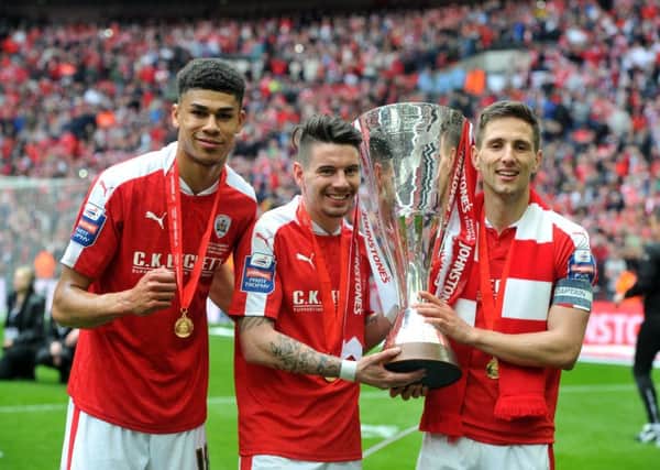 3 April 2016.......  Barnsley v Oxford United Johnstone Paints Trophy Final, Wemley Stadium
Tykes Ashley Fletcher, Adam Hammill and Conor Hourihane with the trophy .Picture by Tony Johnson