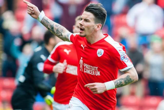 Adam Hammill celebrates after levelling the scores. Photo: Dean Atkins