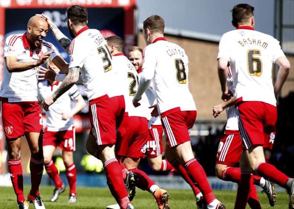 Sheffield United's Alex John-Baptiste celebrates putting his side 1-0 up after only four minutes in the 3-0 win at Chesterfield.  Photo: Simon Bellis/Sportimage