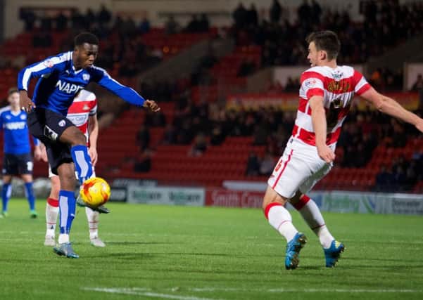 Doncaster Rovers vs Chesterfield - Gboly Ariyibi gets a shot on goal - Pic By James Williamson