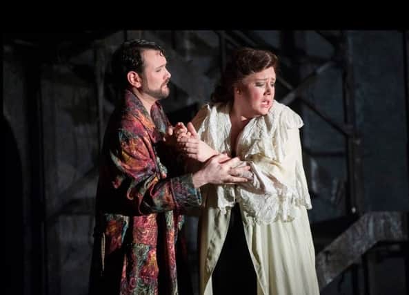 Camilla Roberts (Donna Anna) and Robyn Lyn Evans (Don Ottario) in Don Giovanni, performed by English Touring Opera.