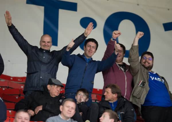 Swindon Town vs Chesterfield - Chesterfield fans at Swindon - Pic By James Williamson