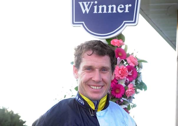 CHAMPION AT LAST -- Richard Johnson, who was crowned champion Jumps jockey after 16 years as runner-up in the shadow of AP McCoy.
