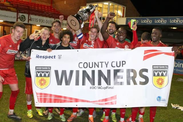 All smiles for Alfreton as they lift the Derbyshire FA Senior Cup - Pic by: Richard Parkes