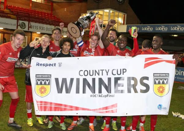 All smiles for Alfreton as they lift the Derbyshire FA Senior Cup  - Pic by: Richard Parkes