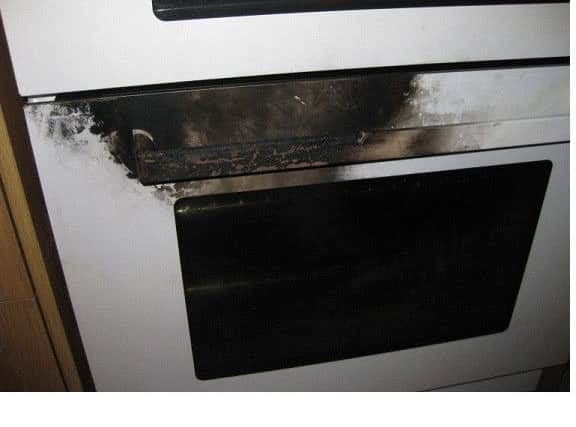 The damage to Liz's cooker after the fire.