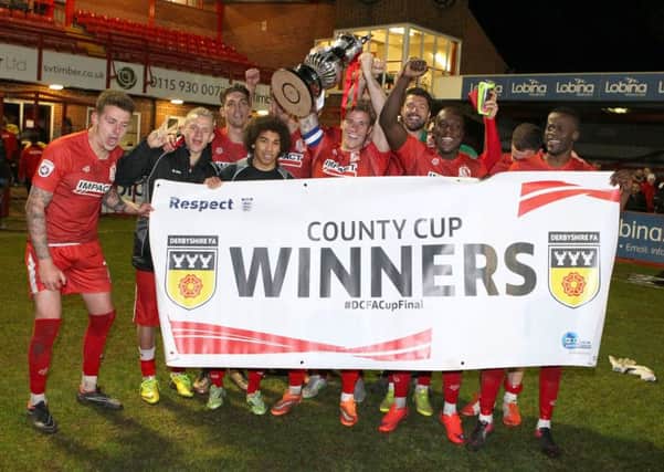 All smiles for Alfreton as they lift the Derbyshire FA Senior Cup  - Pic by: Richard Parkes