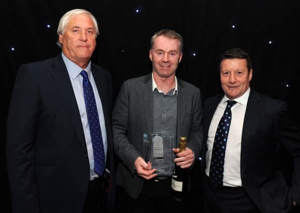 John Sheridan wins the Star Football Hall of Fame Award with Keith Hackett and Danny Wilson at The Star Football Awards. Picture: Andrew Roe