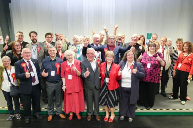 The Labour team toast their successes.