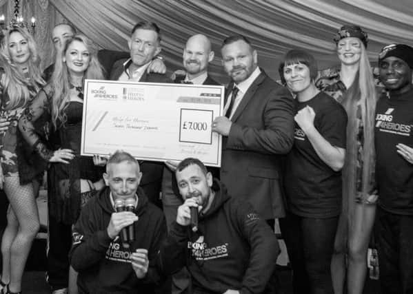 A charity boxing event at Brampton Manor helped to raise Â£8,000 for Help for Heroes.