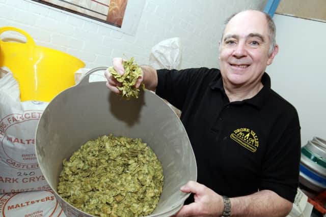 David Mclaren with some of the hops they use.