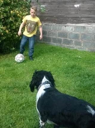 Joe Boyer, 14, playing football in his garden before hit by motorbike in Staveley.
