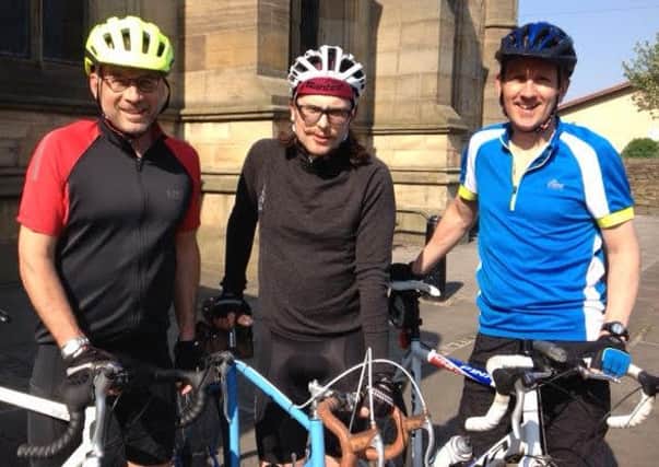Pictured is Rev Phil Batchford, right, and pals Rev Graham Duncan and Rev Harry Steele who are taking on a charity cycling challenge.