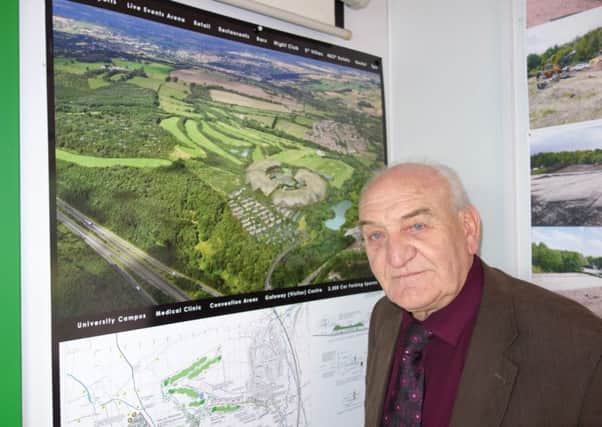 Chesterfield Borough Council leader John Burrows at Birchall Properties headquarters in Unstone and an image of Peak Resort