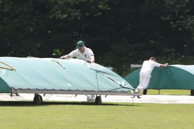 Eckington CC v Cutthorpe, the covers come off for a single over before the rain returned