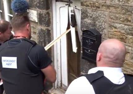 VIDEO: Bailiffs use shovel to smash way into Derbyshire teacher's home ...