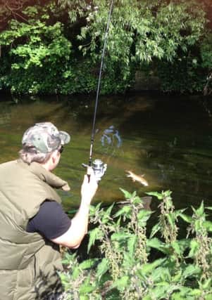 Nathan Mallatratt stalking barbel from the River Idle.