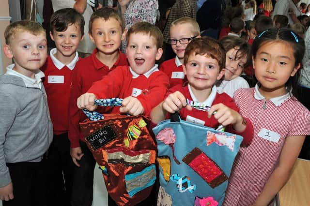 David Nieper, Fashion for Free.
Infants from Alfreton's Copthorne Community School with their bags that they made from re-cycled materials for the David Nieper design competition.