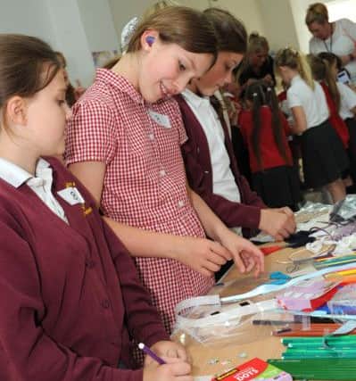 David Nieper, Fashion for Free.Local school children join in with the design activities at the David Nieper factory in Alfreton on Wednesday.