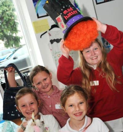 David Nieper, Fashion for Free.Alfreton's Leys Junior School pupils, Caitlin Elliott, Ella Williams, Constance Curran and Natasha Faith with their designs which they entered in the David Nieper design competition.