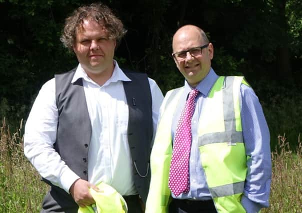 James Jackson, the environmental representative of Friends of Stand Road Park, left, and John Ramsey, right, Chesterfield Borough Council's green spaces officer, at the boggy part of Stand Road park which will be transformed.