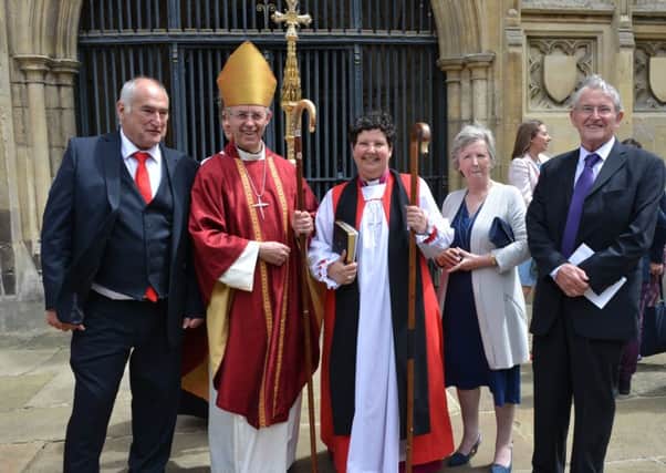 The new Bishop of Repton Jan McFarlane (centre) at her consecration with the Archbishop of Canterbury. Photo: Robert Berry/ Canterbury Cathedral.
