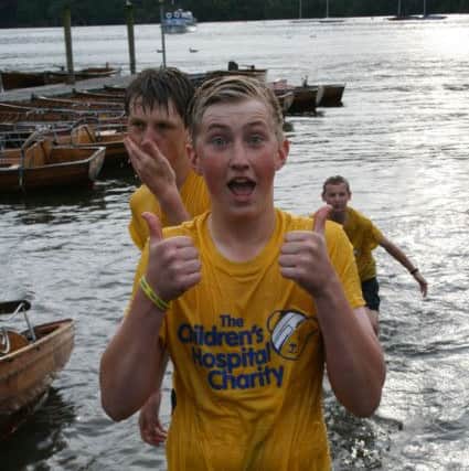 Andrew emerges from Windermere.