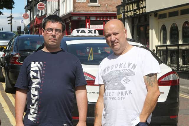 Taxi drivers Martin Hibbert and Paul Mann are concerned about an apparent lack of police on Corporation Street at kicking out time. Picture by Jason Chadwick.