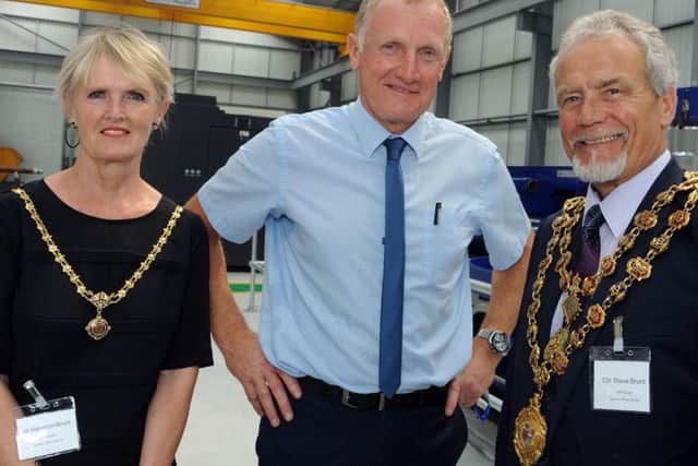 Krantech's Chief Executive officer, Mel Myronko, centre, welcomes the Mayor and Mayoress of Chesterfield, Coun. Steve Brunt and Mrs Jill Mannion-Brunt to the opening of their new CNC facility in Staveley on Wednesday.