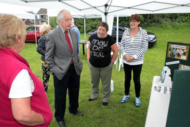 MP Dennis Skinner chats to the ladies from the WI at the fun day at Brockley Primary School in Shuttlewood. Photo by Glenn Ashley Photography.