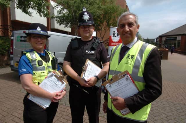 Deputy police commisioner in Alfretons severn square. Tracey Barks pcso Alfreton team, pc Pete Wilbourne beat officer South Normanton and Pinxton and Hardyal Dhindsa deputy police and crime commisioner for Derbyshire.