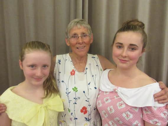 Eileen Robinson with her granddaughters Suzanna and Abigail.