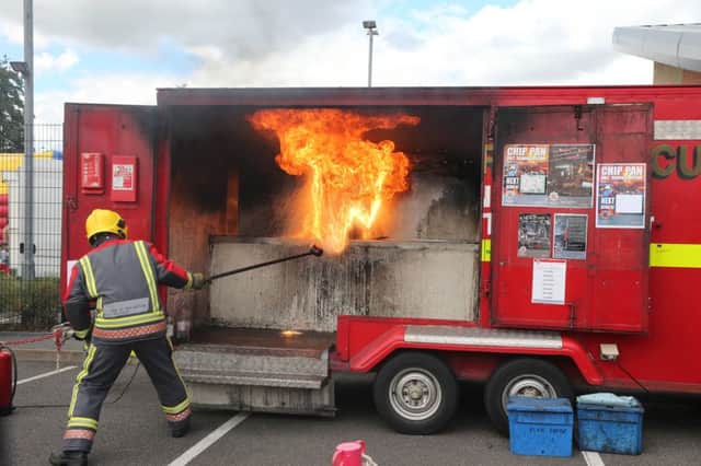 NDET Staveley Fire Day    Chris Lofley showing the dangers of putting water on a chip pan fire
