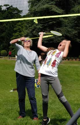 Summer of Sport activities at National Trust Peak District properties: Sue Barker and granddaughter Isabelle Gavin playing badminton