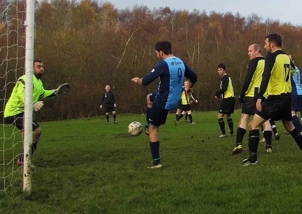 GOALMOUTH ACTION from the Chesterfield and District NAPIT Sunday League last season.
