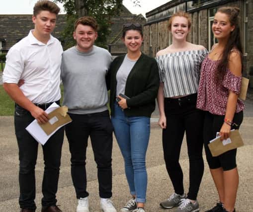 Students at Lady Manners School celebrate their A-Level results.